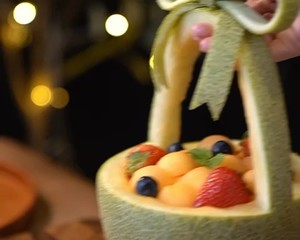 Step 4 of the girly cantaloupe fruit basket